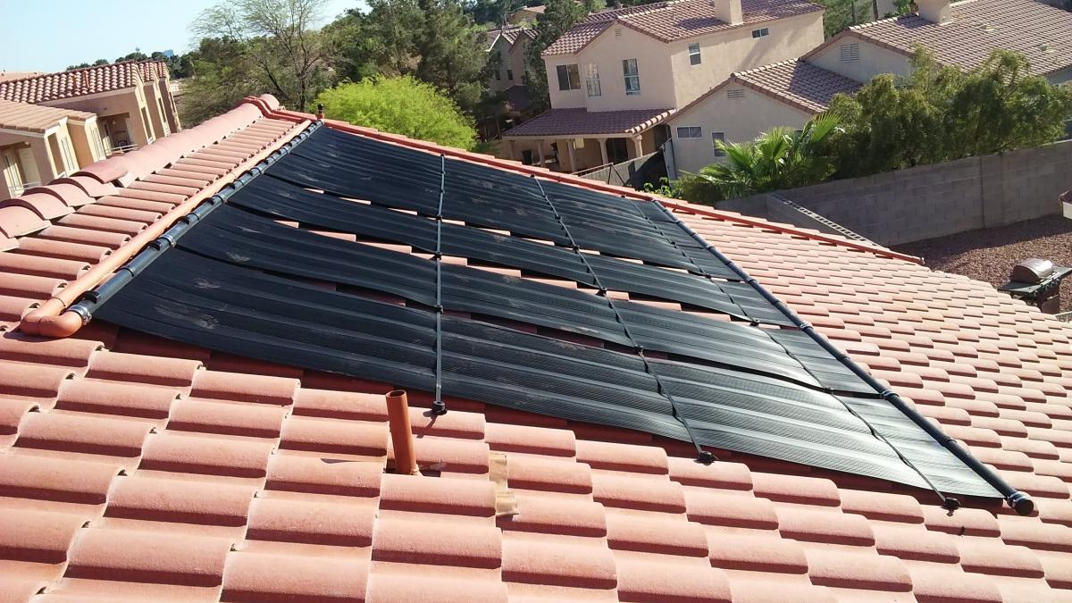 project-10 Solar pool heater on roof.